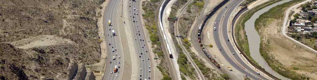 Aerial photograph of line of traffic waiting to cross the border.