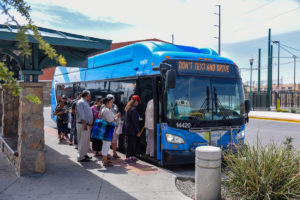 Photo of passengers getting on a Sun Metro Bus in El Paso, Texas.